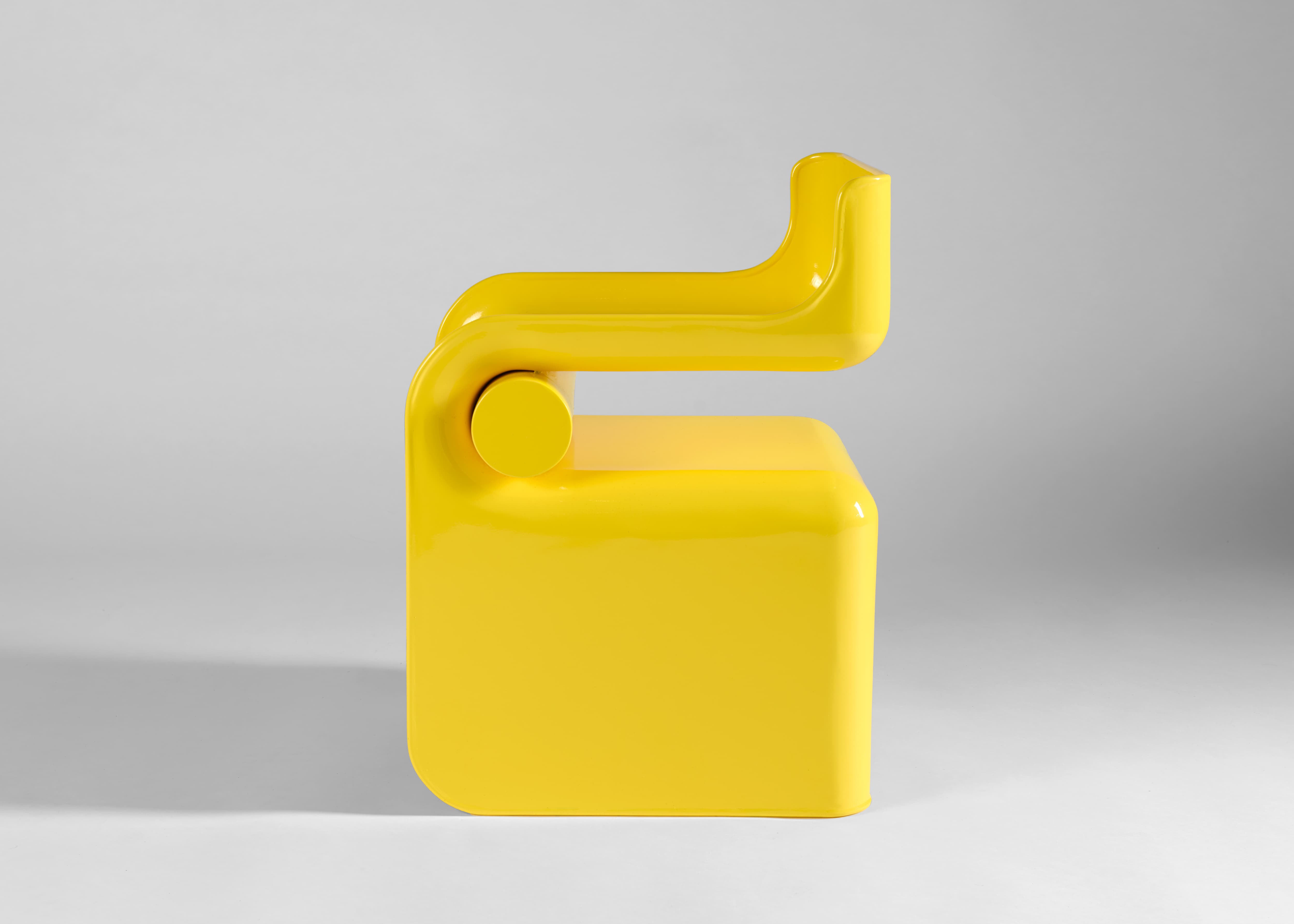 Robusto Dining Chair design by Studio Carol Egan, a Side Elevation view showing Robusto Dining Chair in yellow color. Fabricated in Fiberglass. Armless chair with cantilevered seat and cylinder element. Measures 24”h x 18”w X 19”d x 16”SH
