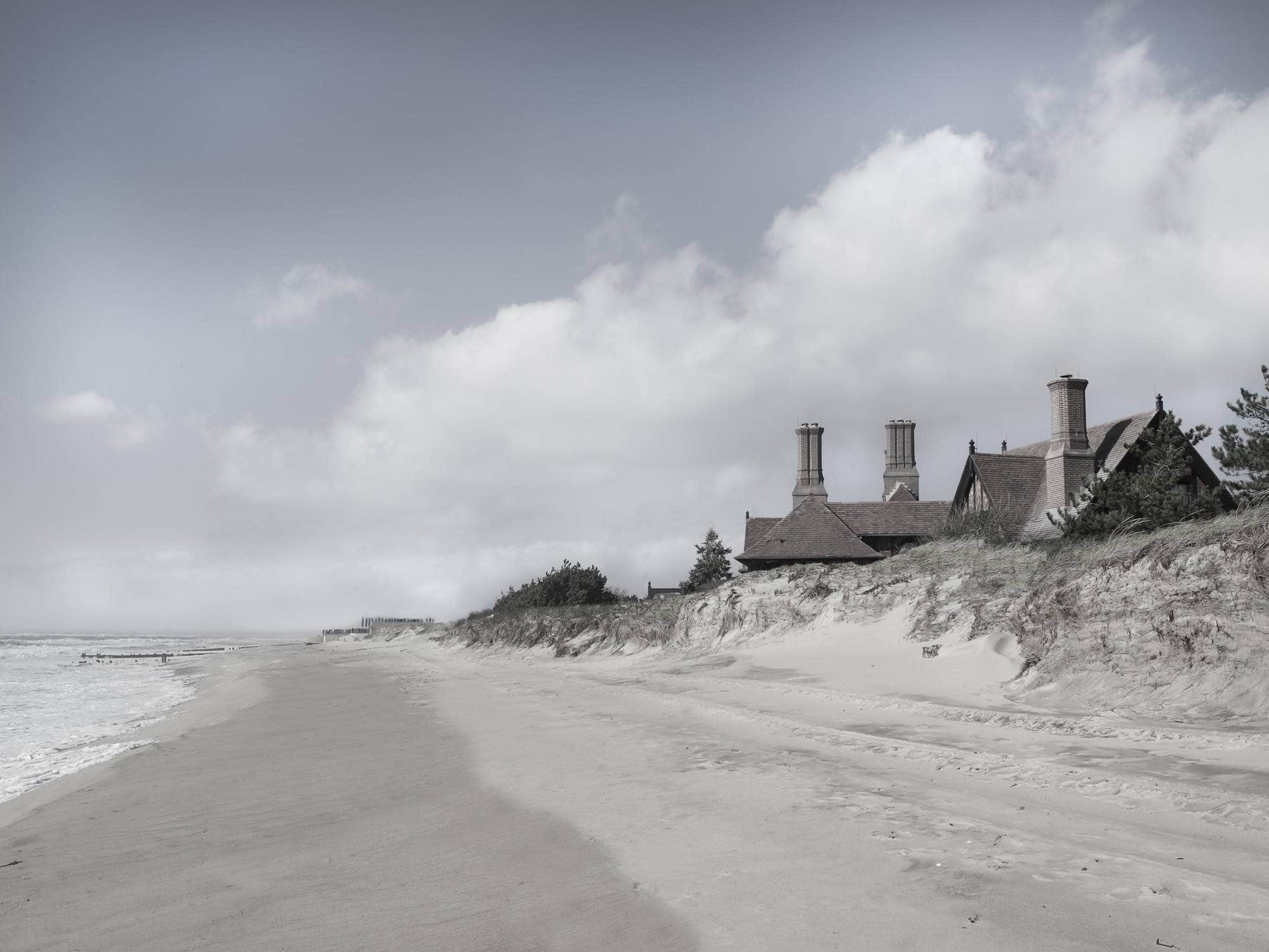 With interiors designed by Carol Egan, this image is an exterior shot of the back of the residence "Woolden Manor Estate" on Gin Lane in Southampton, built in 1928 on the oceanfront.